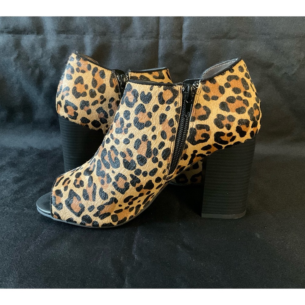Open toe high heeled boots by Moda Spana